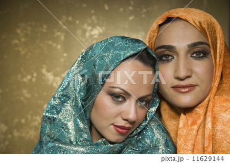 Middle Eastern women wearing head scarves Middle Eastern women wearing head scarves 11629144