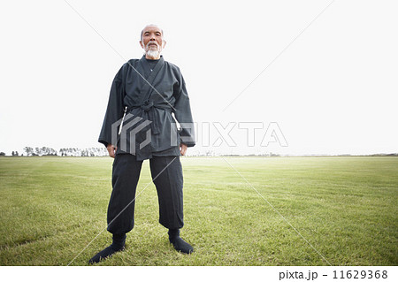 Senior Asian man in field 11629368