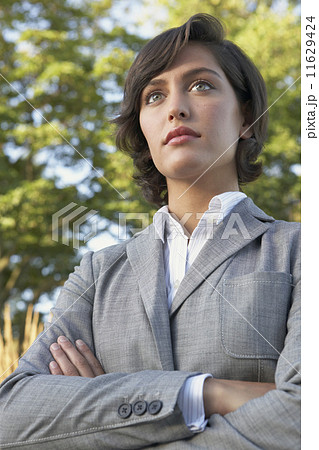 Portrait of Hispanic businesswoman with arms crossed 11629424