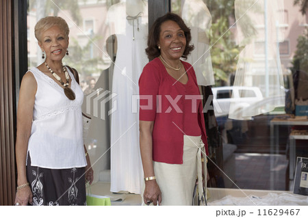 Senior African American women window shopping 11629467