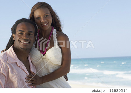 Multi-ethnic couple hugging Multi-ethnic couple hugging 11629514