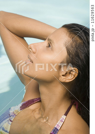 Close up of Indian woman in swimming pool 11629563