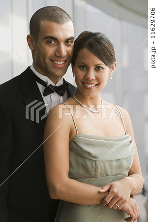 Hispanic couple in evening wear Hispanic couple in evening wear 11629706