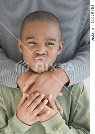 African boy blowing kiss 11629763