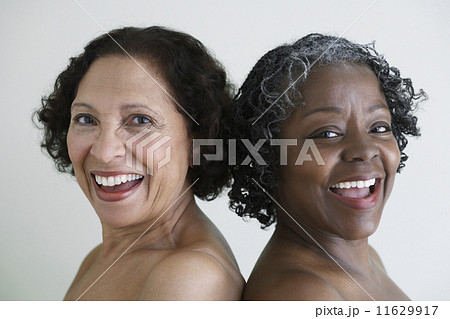 Two senior African women with bare shoulders 11629917