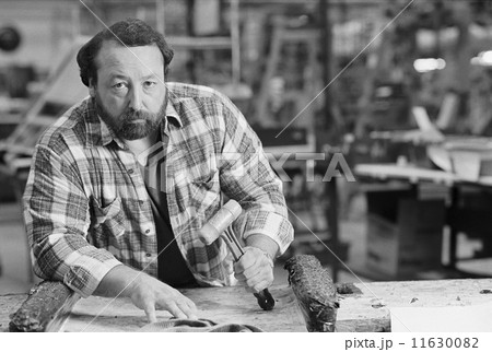 Portrait of blue collar worker in shop 11630082