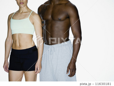 Multi-ethnic couple in athletic gear 11630181