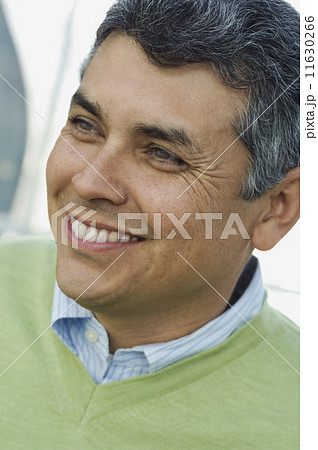 Hispanic man looking to side 11630266