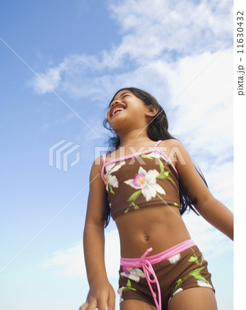 Pacific Islander girl wearing bathing suit Pacific Islander girl wearing bathing suit 11630432