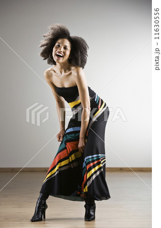 African American woman wearing strapless dress African American woman wearing strapless dress 11630556
