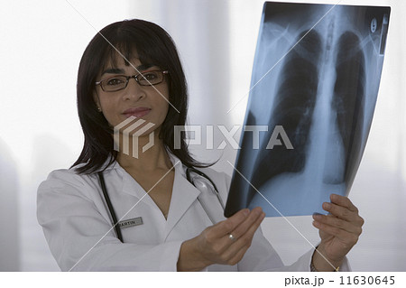 Female doctor holding x-ray 11630645