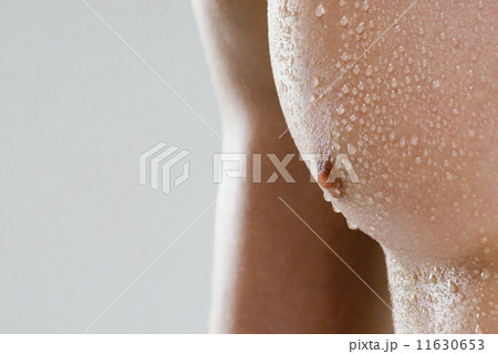 Close up of man's wet chest 11630653