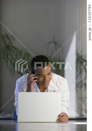 African man talking on cell phone African man talking on cell phone 11630794