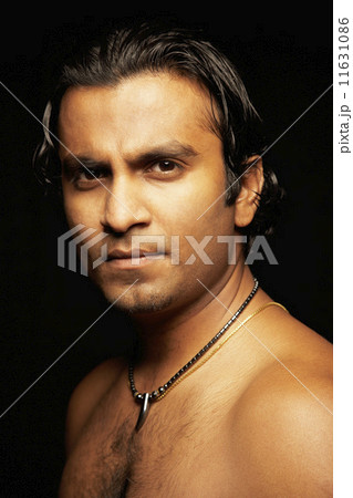 Indian man wearing necklace 11631086