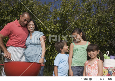 Hispanic family barbequing 11631166