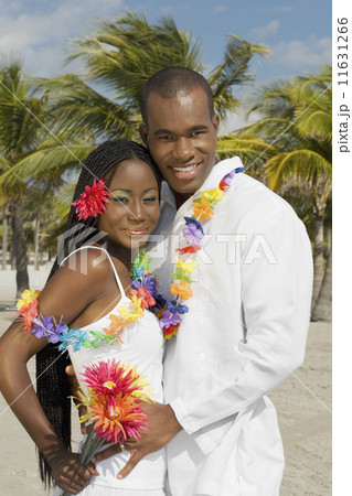 African couple hugging at beach African couple hugging at beach 11631266