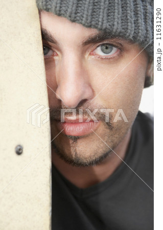 Hispanic man wearing wool hat 11631290