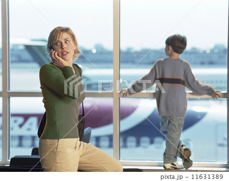 Mother and son at airport 11631389