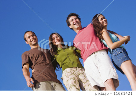 Low angle view of Hispanic couples Low angle view of Hispanic couples 11631421