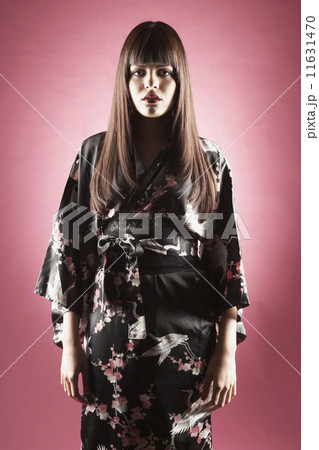 Middle Eastern woman wearing silk robe Middle Eastern woman wearing silk robe 11631470