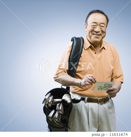 Senior Asian man carrying golf bag 11631674