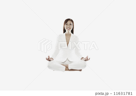 Asian woman meditating 11631781