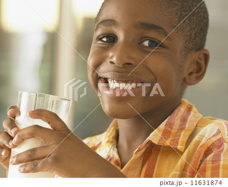 African boy drinking glass of milk African boy drinking glass of milk 11631874