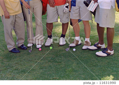 Multi-ethnic friends on golf course Multi-ethnic friends on golf course 11631990