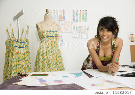 Indian female fashion designer in workshop Indian female fashion designer in workshop 11632017
