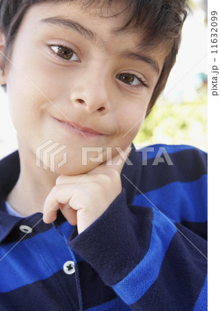 Hispanic boy making a face Hispanic boy making a face 11632099