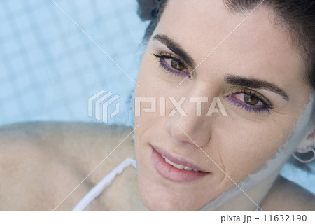 Hispanic woman in swimming pool Hispanic woman in swimming pool 11632190