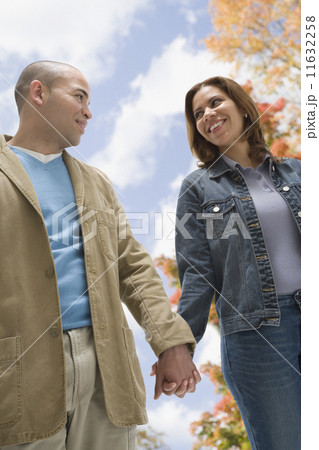 African American couple smiling at each other 11632258