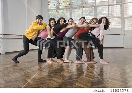 Hispanic dancers posing in dance studio 11632578