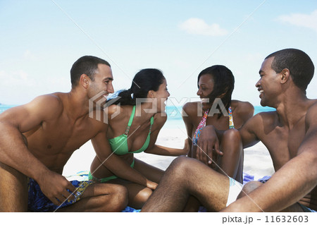 Multi-ethnic couples in bathing suits 11632603