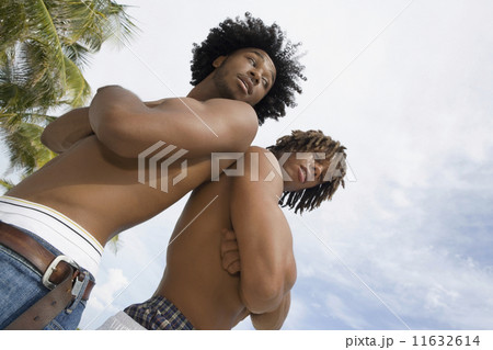 African men standing back to back African men standing back to back 11632614