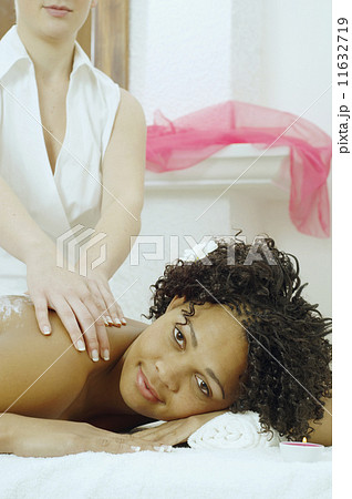 African woman receiving massage 11632719