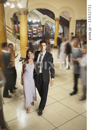 Young Hispanic couple in evening wear Young Hispanic couple in evening wear 11632731