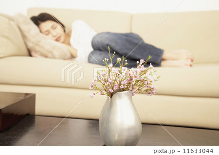 Asian woman sleeping on sofa Asian woman sleeping on sofa 11633044