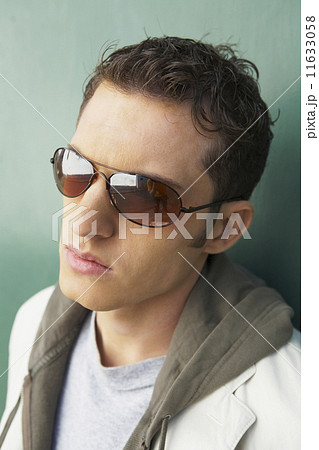 Young man wearing sunglasses Young man wearing sunglasses 11633058