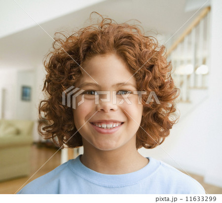 Close up of Mixed Race boy smiling 11633299