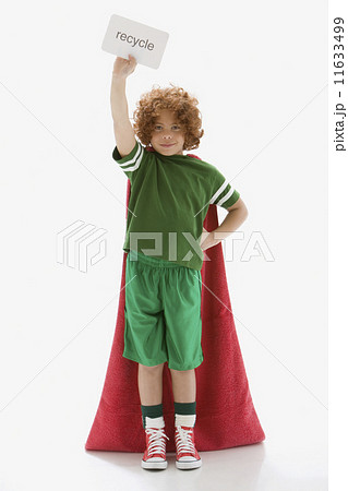 Mixed Race boy holding recycle sign 11633499