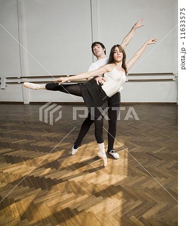 Hispanic dancers practicing in dance studio 11633575