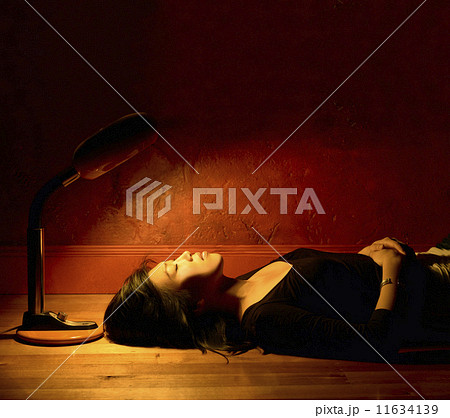 Woman resting on floor 11634139
