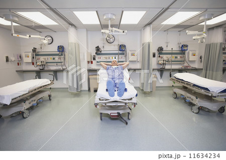 Doctor sleeping in hospital bed Doctor sleeping in hospital bed 11634234