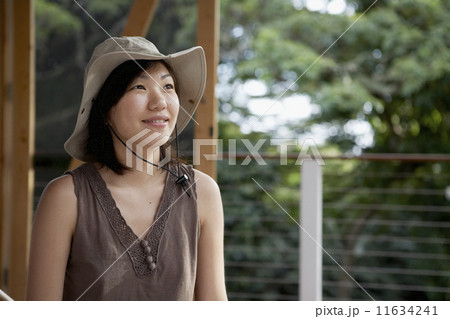 Asian woman wearing safari hat Asian woman wearing safari hat 11634241