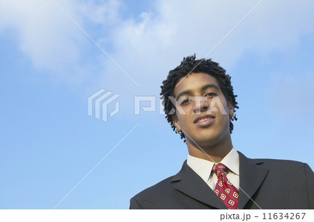 African businessman under blue sky African businessman under blue sky 11634267