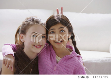 Two girls acting silly 11634269