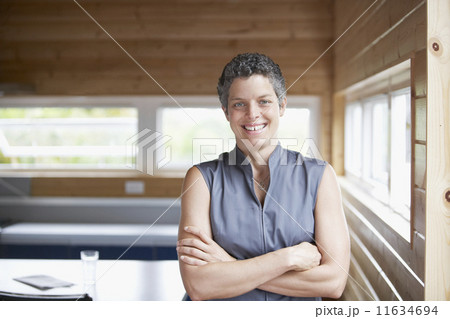 Mixed Race woman with arms crossed Mixed Race woman with arms crossed 11634694