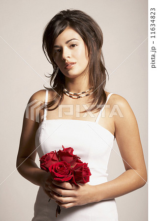 Asian bride holding flowers Asian bride holding flowers 11634823
