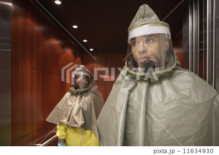 African man and woman in hazmat suits African man and woman in hazmat suits 11634930